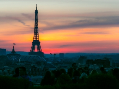 People gathered to watch the sunset with the Eiffel Tower in the backdrop